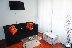 PF-RS2: Sala con TV y con acceso a pequeño balcon