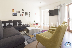 RE-RY: Lounge with TV and view to the main access